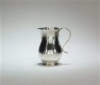 Lot 3 - An early George II silver cream jug