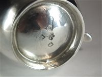 Lot 3 - An early George II silver cream jug
