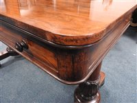 Lot 889 - A Regency rosewood library table