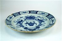 Lot 99 - An 18th century blue and white delft plate