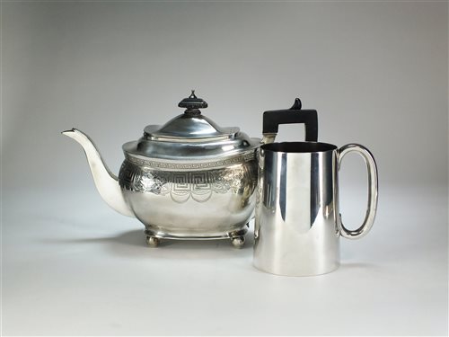 Lot 42 - A silver mug and teapot
