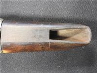 Lot 286 - An unboxed French three sectional polished hardwood clarinet