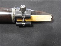 Lot 286 - An unboxed French three sectional polished hardwood clarinet