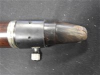 Lot 286 - An unboxed French three sectional polished hardwood clarinet