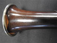 Lot 286 - An unboxed French three sectional polished hardwood clarinet