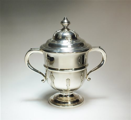 Lot 76 - A two handled silver cup and cover