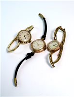 Lot 55 - Three (3) 9ct ladies wristwatches.