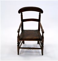Lot 335 - A Victorian child’s elm commode stool