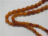 Lot 33 - An Amber bead necklace