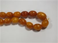 Lot 33 - An Amber bead necklace