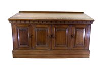 Lot 317 - A large early 20th century oak sideboard or shop cabinet