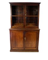 Lot 323 - A Victorian oak cabinet bookcase
