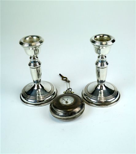 Lot 4 - A pair of silver mounted short candlesticks