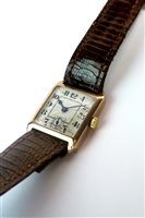 Lot 196 - A 9ct rose gold rectangular wristwatch.
