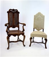 Lot 390 - A colonial style walnut open armchair