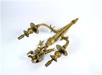 Lot 307 - A decorative pair of Regency style gilded cast brass wall sconces