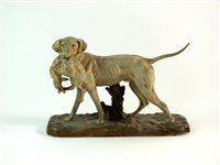 Lot 75 - A Royal Dux model of a dog with rabbit