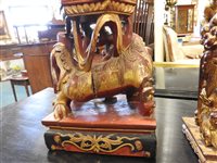 Lot 145 - Two Chinese painted carved hardwood temple lions