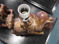 Lot 145 - Two Chinese painted carved hardwood temple lions