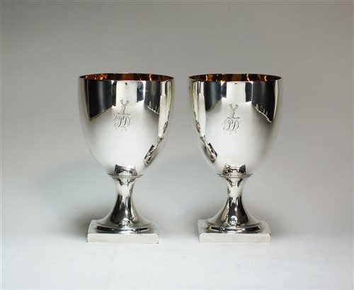 Lot 93 - A pair of George III silver goblets