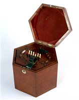 Lot 285 - A Edwardian mahogany cased 48 button concertina by George Case of Boosey & Sons