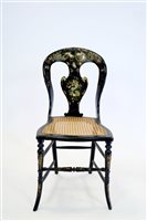 Lot 384 - A Victorian lacquered and mother of pearl inlaid cane seat parlour chair