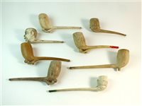 Lot 104 - Eight Cadger figural clay pipes