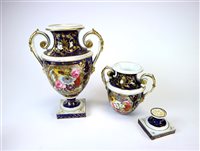 Lot 123 - A Derby porcelain twin-handled vase and one other vase