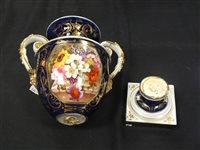 Lot 123 - A Derby porcelain twin-handled vase and one other vase
