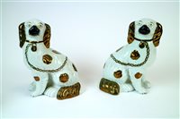 Lot 115 - A pair of Staffordshire dogs