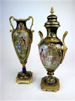 Lot 80 - A garniture of French vases