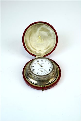 Lot 14 - A cased silver mounted travelling timepiece