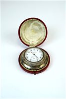 Lot 14 - A cased silver mounted travelling timepiece