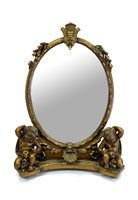 Lot 374 - A decorative dressing mirror with gilt style frame