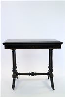 Lot 348 - A Victorian Aesthetic movement ebony fold-over top card table