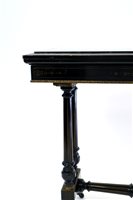 Lot 348 - A Victorian Aesthetic movement ebony fold-over top card table