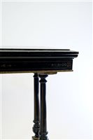Lot 348 - A Victorian Aesthetic movement ebony fold-over top card table