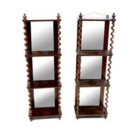 Lot 331 - A pair of Victorian rosewood mirror back wall shelves