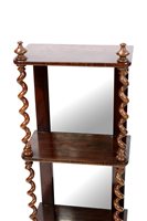Lot 331 - A pair of Victorian rosewood mirror back wall shelves
