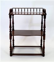 Lot 359 - A Victorian mahogany two tier what-not
