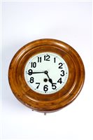 Lot 698 - An early 20th century stained pine cased wall clock