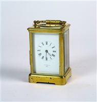 Lot 295 - A gilt brass carriage timepiece