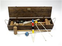 Lot 211 - A 20th century Shropshire made wooden croquet set in a pine case