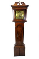 Lot 452 - A George III oak and inlaid longcase clock