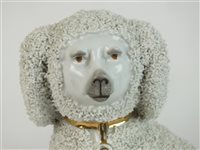 Lot 49 - A pair of Continental porcelain shredded clay poodles