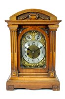 Lot 687 - A Victorian walnut cased bracket clock
