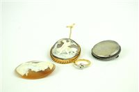 Lot 24 - Three cameos, a ring and a coin brooch