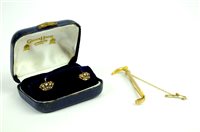 Lot 25 - A pair of naval crown earrings