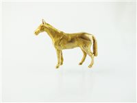 Lot 186 - A 9ct gold horse brooch