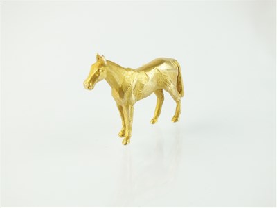 Lot 186 - A 9ct gold horse brooch